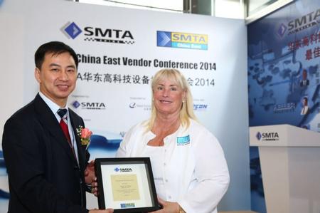 Megan Wendling receives her sixth SMTA China Councilor of the Year award from SMTA China’s Abby Tsoi at a ceremony held at the recent NEPCON China